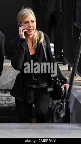 Jennifer Aniston is all smiles as she films scenes for her new movie