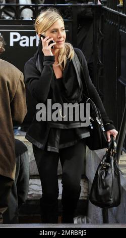 Jennifer Aniston is all smiles as she films scenes for her new movie