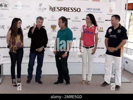 John Walsh and daughter Megan pose for photos at the VIP tent during the AMG Miami Beach Polo World Cup presented by Nespresso. Miami Beach, FL. 4/21/11. Stock Photo