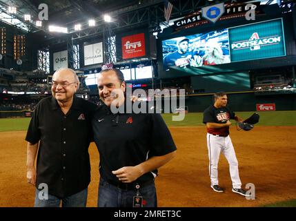 Miami Marlins baseball team CEO Derek Jeter, center, speaks to members of  the media inside Marlins Park stadium, Monday, Feb. 11, 2019, in Miami.  Jeter is entering his second season as CEO