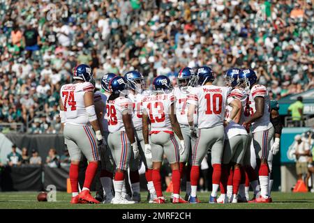 New York Giants players huddle up during an NFL football game