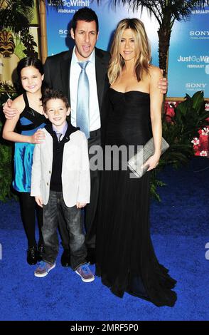 Jennifer Aniston, Adam Sandler, Bailee Madison and Griffin Gluck at the premiere of 'Just Go With It' at the Ziegfeld Theatre in New York, NY. 2/8/11. Stock Photo