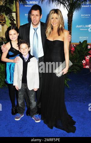 Jennifer Aniston, Adam Sandler, Bailee Madison and Griffin Gluck at the premiere of 'Just Go With It' at the Ziegfeld Theatre in New York, NY. 2/8/11. Stock Photo