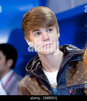 Justin Bieber wears a denim Louis Vuitton jacket as he makes a special  appearance with television