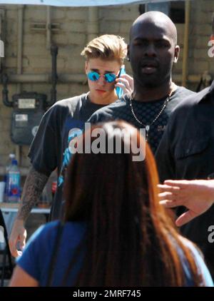 Justin Bieber is spotted on his cellphone in Beverly Hills with his