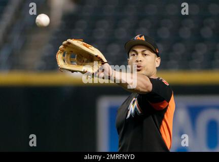 Miami Marlins right fielder Giancarlo Stanton catches a fly ball by Atlanta  Braves' Mallex Smith during the ninth inning of a baseball game, Friday,  April 15, 2016, in Miami. The Braves won