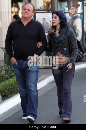 TV personality Kat Von D and her father Rene Drachenberg were seen at The Grove Shopping Center on Christmas Eve doing some last minute holiday shopping. Los Angeles, CA. 24th December 2011. Stock Photo