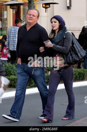 TV personality Kat Von D and her father Rene Drachenberg were seen at The Grove Shopping Center on Christmas Eve doing some last minute holiday shopping. Los Angeles, CA. 24th December 2011. Stock Photo