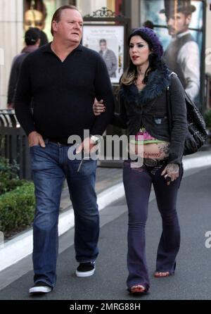 TV personality Kat Von D and her father Rene Drachenberg were seen at The Grove Shopping Center on Christmas Eve doing some last minute holiday shopping. Los Angeles, CA. 24th December 2011. Stock Photo