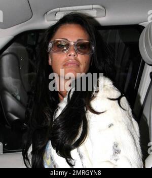 Katie Price leaves the Mayfair Hotel  in her white Range Rover Sport and matching white fur jacket separate from Alex Reid, London, UK, 04/20/10. Stock Photo