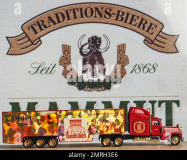 Germany. 01st Feb, 2023. In this photo illustration, a model of a truck with the inscription Mummut on the background of the company logo on the monitor screen. The Mammut Brauerei Brewer in Sangerhausen, Saxony-Anhalt, Germany was founded in 1436. (Photo by Igor Golovniov/SOPA Images/Sipa USA) Credit: Sipa USA/Alamy Live News Stock Photo