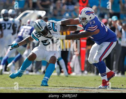 November 11, 2018 - East Rutherford, New Jersey, U.S. - Buffalo Bills  offensive tackle Dion Dawkins (73) catches a touchdown pass as New York  Jets linebacker Jeremiah Attaochu (55) tries to defend