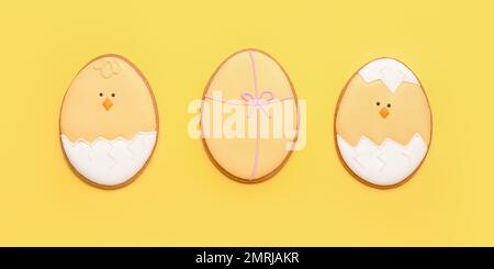 Beautiful Easter cookies on yellow background Stock Photo