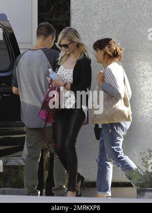 EXCLUSIVE!! Actress Kirsten Dunst wears sky-high heels as she leaves