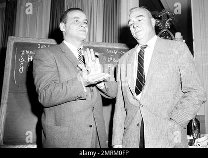 Coach Sid Gillman, left, who piloted he Los Angeles Rams to the Western  Division championship of the NFL in his rookie year, poses with two of his  star ends, Elroy Hirsch, center