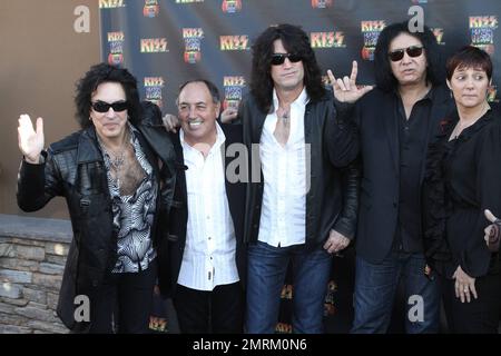 Paul Stanley poses with Hello Kitty at the KISS by Monster Mini