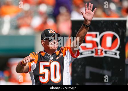 Cincinnati Bengals quarterback Ken Anderson has his head turned almost  completely around by Piuttsburgh Steeler defender Keith Gary (92) during  the second quarter of their NFL game at Riverfront Dtadium in Cincinnati