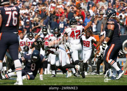 Atlanta Falcons players celebrate after an interception by