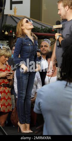 Currently celebrating 25 years in the music business, pop superstar Kylie Minogue makes an appearance at The Grove for an interview with Mario Lopez. Los Angeles, CA. 13th November 2012. Stock Photo