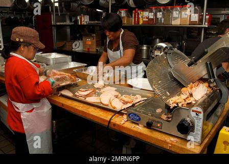 In the kitchen at the LA Mission Thanksgiving meal. Los Angeles, CA. 21st November 2012. Stock Photo
