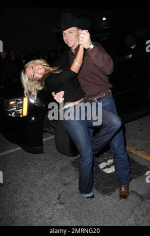 Jewel's husband and new 'Dancing with the Stars' contestant Ty Murray dances with a fan after arriving at the Star Magazine Lady Gaga concert at the nightclub Apple in Los Angeles, CA. 3/11/09. Stock Photo