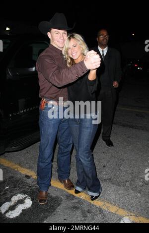 Jewel's husband and new 'Dancing with the Stars' contestant Ty Murray dances with a fan after arriving at the Star Magazine Lady Gaga concert at the nightclub Apple in Los Angeles, CA. 3/11/09. Stock Photo