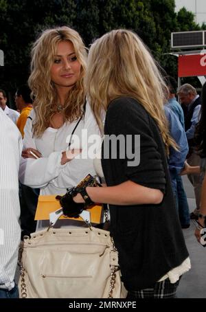 Alyson Michalka and Amanda Michalka (also known as Aly & AJ) of the pop band 78violet arrive at the Staples Center to watch the Utah Jazz verses the Los Angeles Lakers basketball game. Los Angeles, CA. 04/05/11. Stock Photo