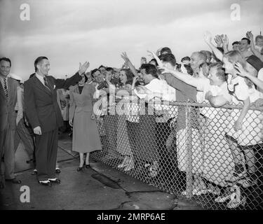 First baseman of the Philadelphia Phillies Eddie Waitkus and Carol Webel of  Albany leave the altar of St. Patrick's Church in Albany, N.Y., Nov. 17,  1951, after their wedding ceremony. (AP Photo