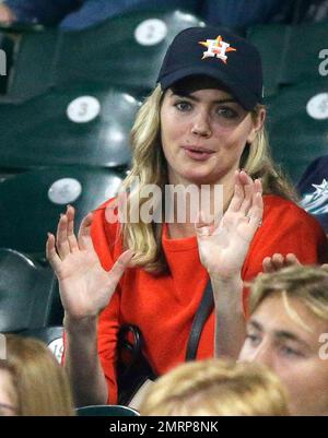 Actress and model Kate Upton watches from the stands as her fiancé