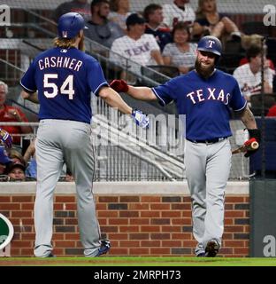 Mike Napoli talks to the media during a news conference at spring training  baseball practice Thursday, Feb. 16, 2017, in Surprise, Ariz. The Rangers  announced that the club has signed free agent