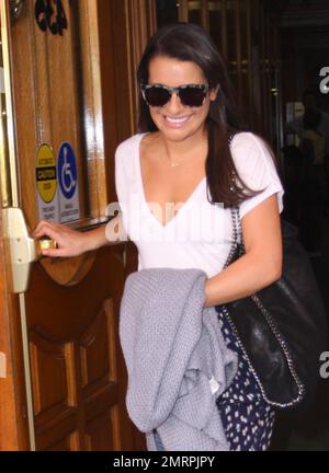 'Glee' star Lea Michele wears a white top, patterned skirt and flip flops while out running errands in Beverly Hills, CA. 11th October 2011. Stock Photo