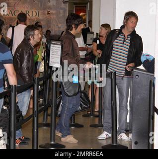 Exclusive!! Oasis Frontman Liam Gallagher looked Miami nice as he arrived at Miami airport channeling Sonny Crocket from Miami Vice. Liam was wearing a cream suit and animal print shoes as he took a flight to South America where Oasis are playing. Miami, Fl. 4/27/09.     . Stock Photo