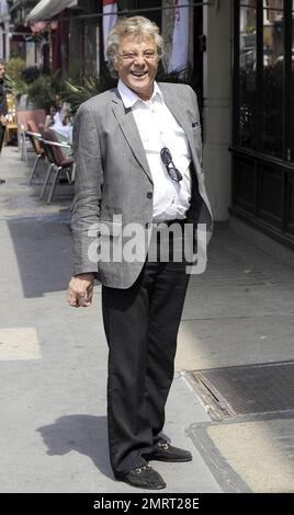 Lionel Blair takes a quick smoke break in the West End of London, UK. 6/23/10. . Stock Photo