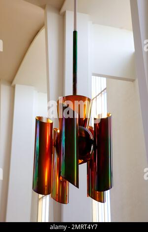 Lakeuden Risti church by Alvar Aalto, interior detail with ceiling lamp. The interior of the church is designed entirely by Aalto. Seinajoki, Finland. Stock Photo