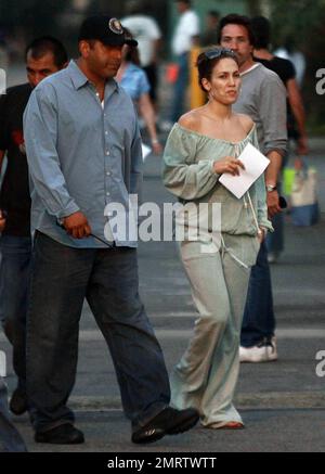 Jennifer Lopez continues filming on The Back-up Plan. Lopez was spotted wearing an off-the-shoulder top and matching sweat pants. San Fernando Valley, Ca. 6/17/09. . Stock Photo