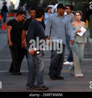 Jennifer Lopez continues filming on The Back-up Plan. Lopez was spotted wearing an off-the-shoulder top and matching sweat pants. San Fernando Valley, Ca. 6/17/09. . Stock Photo