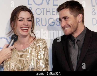 Co-stars Anne Hathaway and Jake Gyllenhaal have great chemistry on the red carpet at the premiere of 'Love & Other Drugs' held at Event Cinemas George Street.  The pair affectionately touched and hugged while laughing during an interview with Australian radio and TV personality Lizzy Lovette.  Gyllenhaal, who is reportedly dating young country pop singer Taylor Swift, was very relaxed and animated as he spoke with Lizzy. Sydney, AUS. 12/06/10. Stock Photo