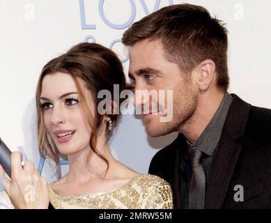 Co-stars Anne Hathaway and Jake Gyllenhaal have great chemistry on the red carpet at the premiere of 'Love & Other Drugs' held at Event Cinemas George Street.  The pair affectionately touched and hugged while laughing during an interview with Australian radio and TV personality Lizzy Lovette.  Gyllenhaal, who is reportedly dating young country pop singer Taylor Swift, was very relaxed and animated as he spoke with Lizzy. Sydney, AUS. 12/06/10. Stock Photo