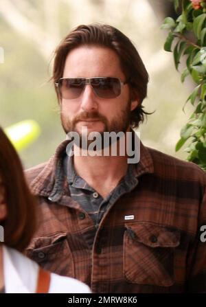 Actor Luke Wilson shows off his beard as he has a casual lunch with friends at Malibu Country Mart.  Later Wilson gets a bit shy and tries to hide his face from photographers. Los Angeles, CA. 07/03/10.   . Stock Photo