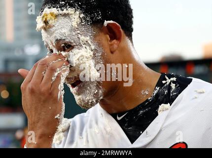 Baltimore Orioles' Manny Machado smiles after teammate Adam Jones hit him  in the face with a pie after a baseball game against the Oakland Athletics  in Baltimore, Wednesday, Aug. 23, 2017. (AP