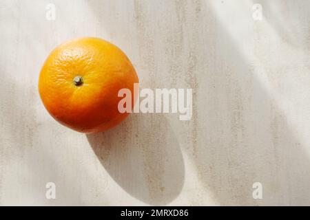 Ripe oranges on table Stock Photo