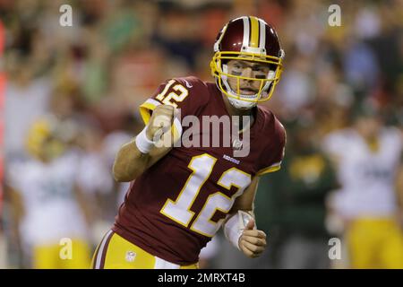 Washington Redskins' Niles Paul celebrates a Tennesee Titans' Dexter  McCluster muffed catch of a punt during the third quarter at FedEx Field in  Landover, Maryland on October 19, 2014. Washington won the