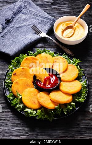 Hot Water Cornbread, corn pones, hoecakes, corn dodgers on plate with ...