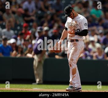 Atlanta Braves left fielder Lane Adams wears a jersey sporting a