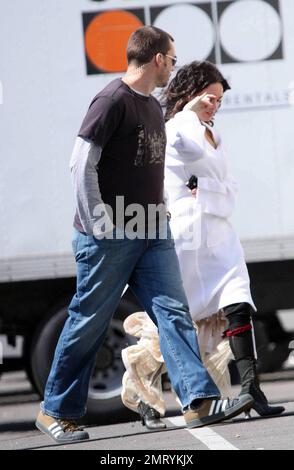 Exclusive!! Megan Fox films on location in Sylmar, CA this morning.  She was seen walking to the set with a white robe covering a frilly cowboy-western style dress, complete with boots and garter.  Fox plays Leila in the upcoming western movie, 'Jonah Hex,' also starring Josh Brolin.  Los Angeles, CA. 4/3/09. Stock Photo