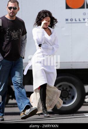 Exclusive!! Megan Fox films on location in Sylmar, CA this morning.  She was seen walking to the set with a white robe covering a frilly cowboy-western style dress, complete with boots and garter.  Fox plays Leila in the upcoming western movie, 'Jonah Hex,' also starring Josh Brolin.  Los Angeles, CA. 4/3/09. Stock Photo