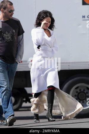 Exclusive!! Megan Fox films on location in Sylmar, CA this morning.  She was seen walking to the set with a white robe covering a frilly cowboy-western style dress, complete with boots and garter.  Fox plays Leila in the upcoming western movie, 'Jonah Hex,' also starring Josh Brolin.  Los Angeles, CA. 4/3/09.     .  . Stock Photo