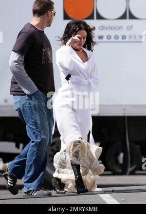 Exclusive!! Megan Fox films on location in Sylmar, CA this morning.  She was seen walking to the set with a white robe covering a frilly cowboy-western style dress, complete with boots and garter.  Fox plays Leila in the upcoming western movie, 'Jonah Hex,' also starring Josh Brolin.  Los Angeles, CA. 4/3/09.     .  . Stock Photo