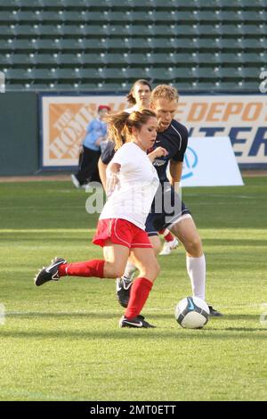 Sabrina Bryan and Casey Jennings take part in a celebrity soccer game to raise funds for the Mia Hamm Foundation which supports patients and their families who benefit from bone marrow transplants. The event was hosted by Mia Hamm and Nomar Garciaparra. Los Angeles, CA. 1/16/10.     . Stock Photo