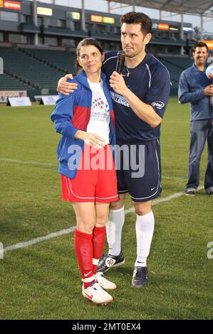 Mia Hamm and Nomar Garciaparra take part in a celebrity soccer game to raise funds for the Mia Hamm Foundation which supports patients and their families who benefit from bone marrow transplants. The event was hosted by Mia Hamm and Nomar Garciaparra. Los Angeles, CA. 1/16/10.   . Stock Photo